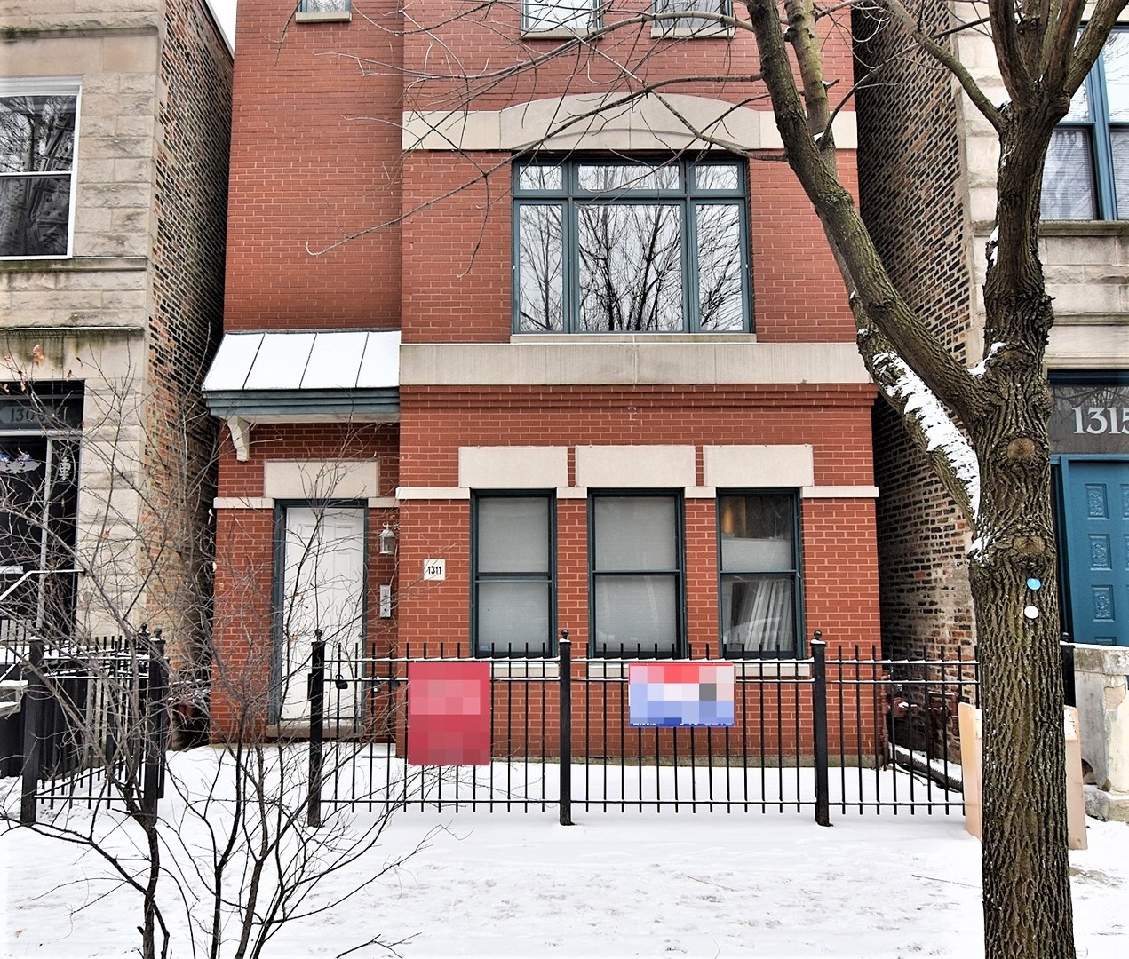 1311 West Fillmore Street, Unit B Chicago, IL 60607 - Photo 2 of 25 a view of a building with a glass door