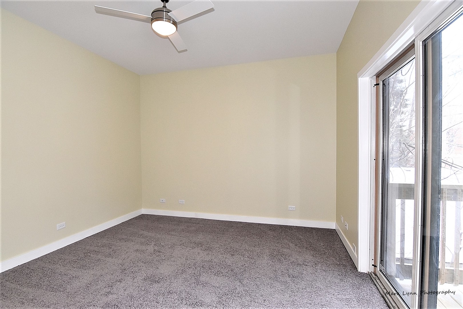 1311 West Fillmore Street, Unit B Chicago, IL 60607 - Photo 16 of 25 a view of a room with a ceiling fan and window