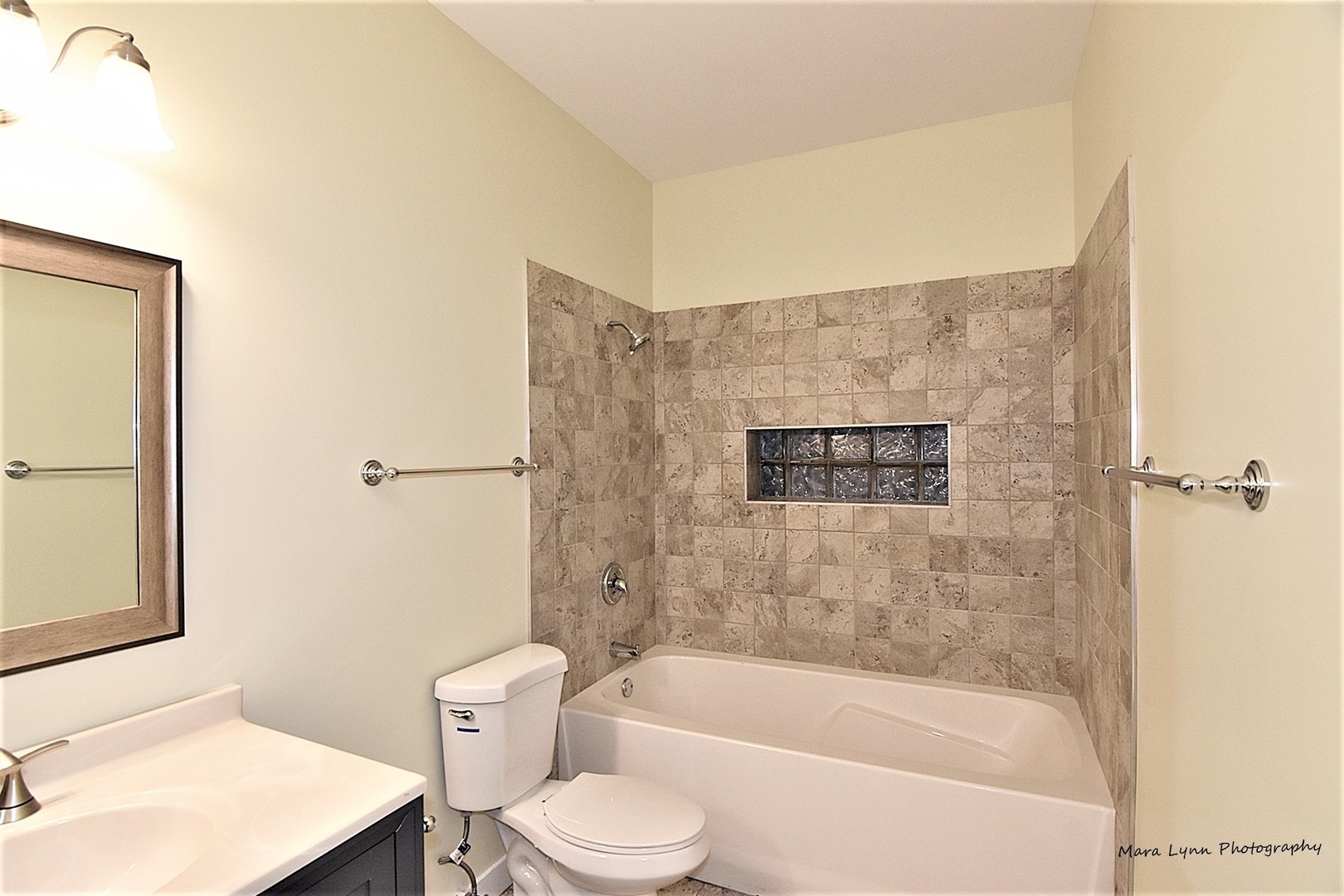 1311 West Fillmore Street, Unit B Chicago, IL 60607 - Photo 20 of 25 a bathroom with a sink a toilet and a bathtub