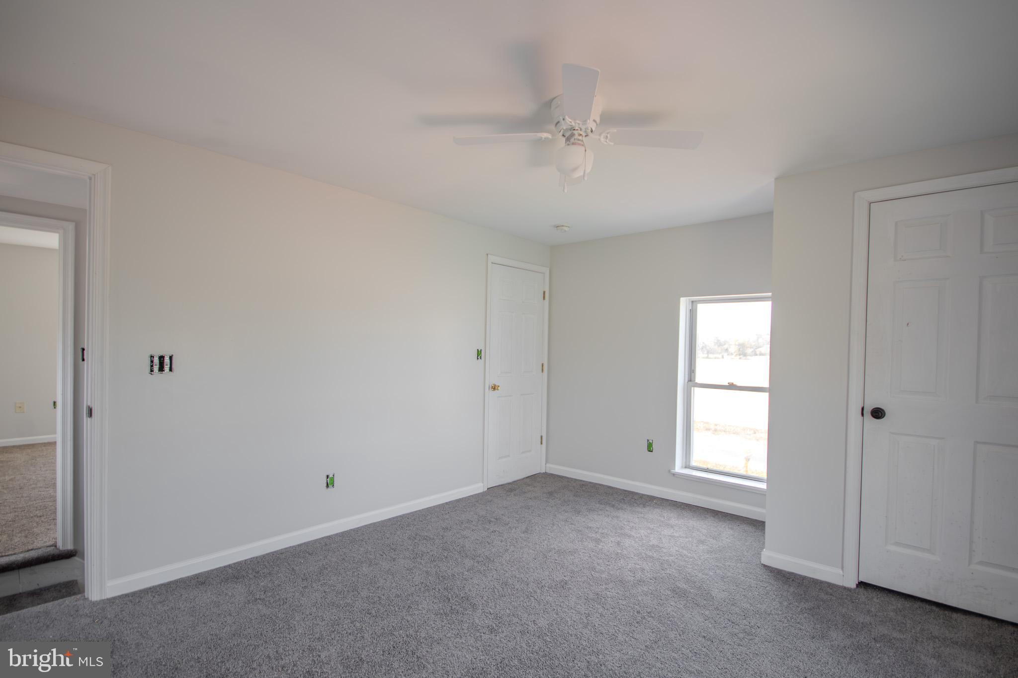 5693 Landon Store Road Marion Station, MD 21838 - Photo 16 of 20 a view of an empty room with a window