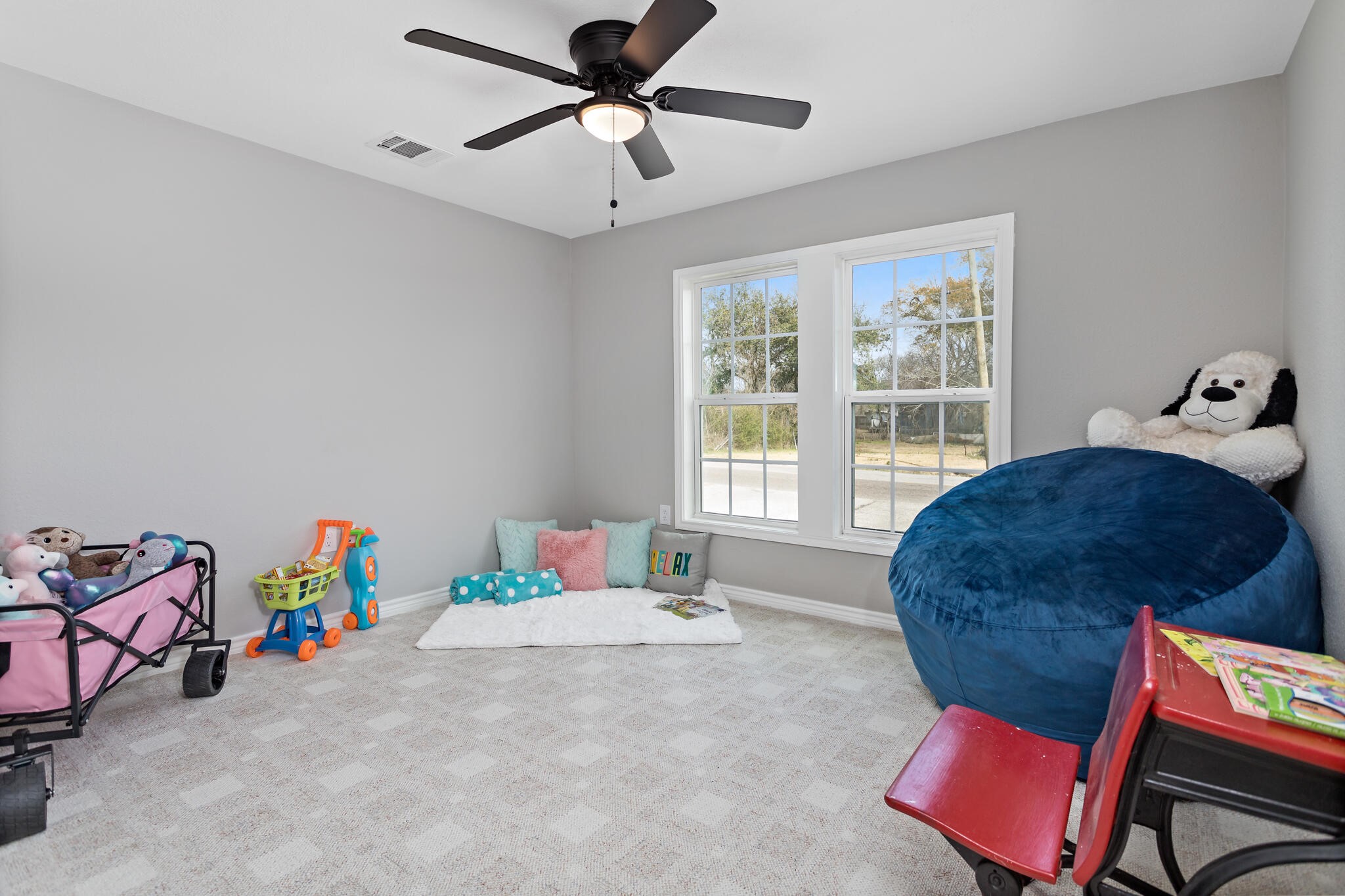 2320 Delaware Street Beaumont, TX 77703 - Photo 23 of 27 a living room with furniture and a large window