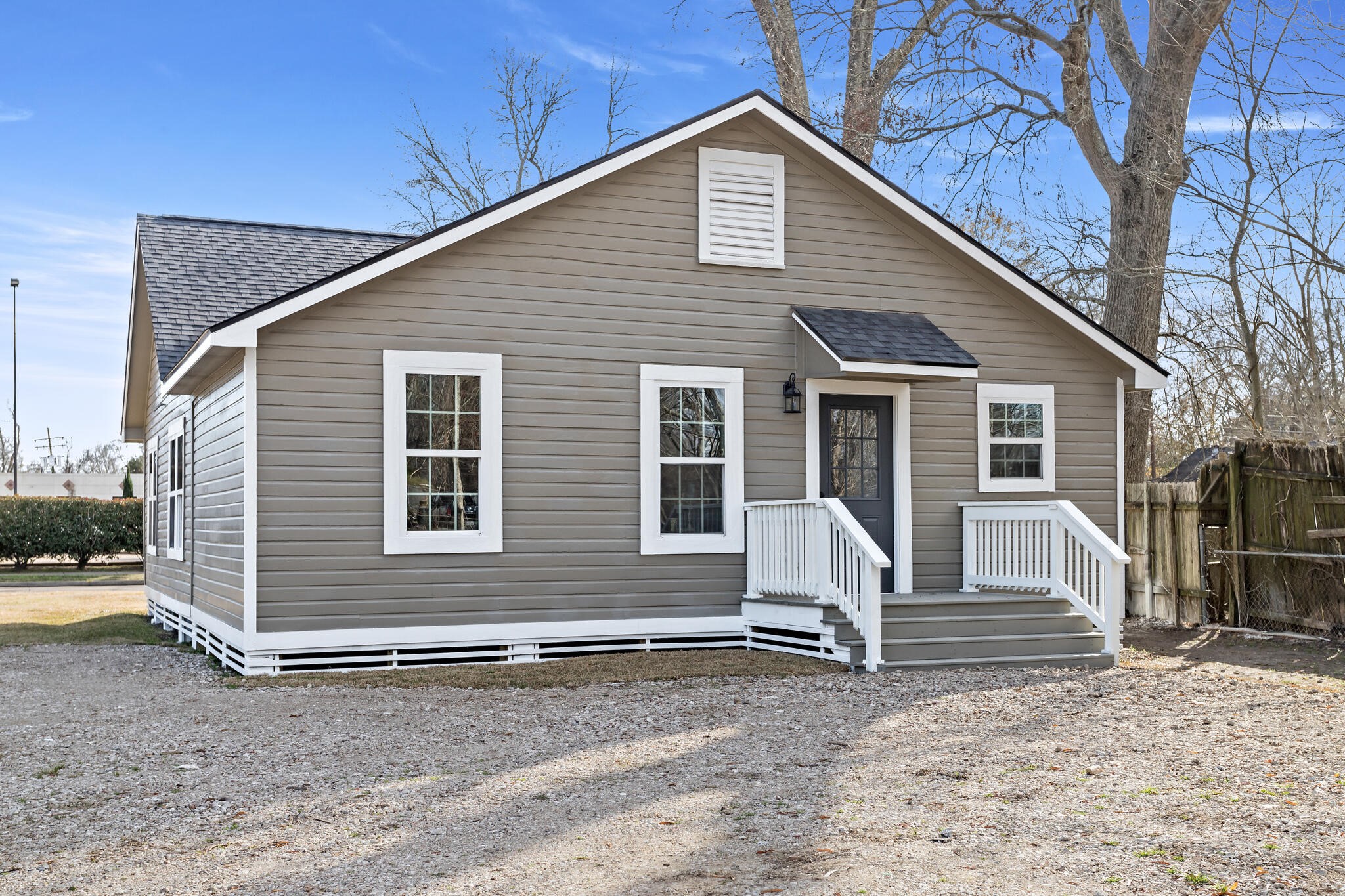 2320 Delaware Street Beaumont, TX 77703 - Photo 27 of 27 a front view of a house with a yard and seating space