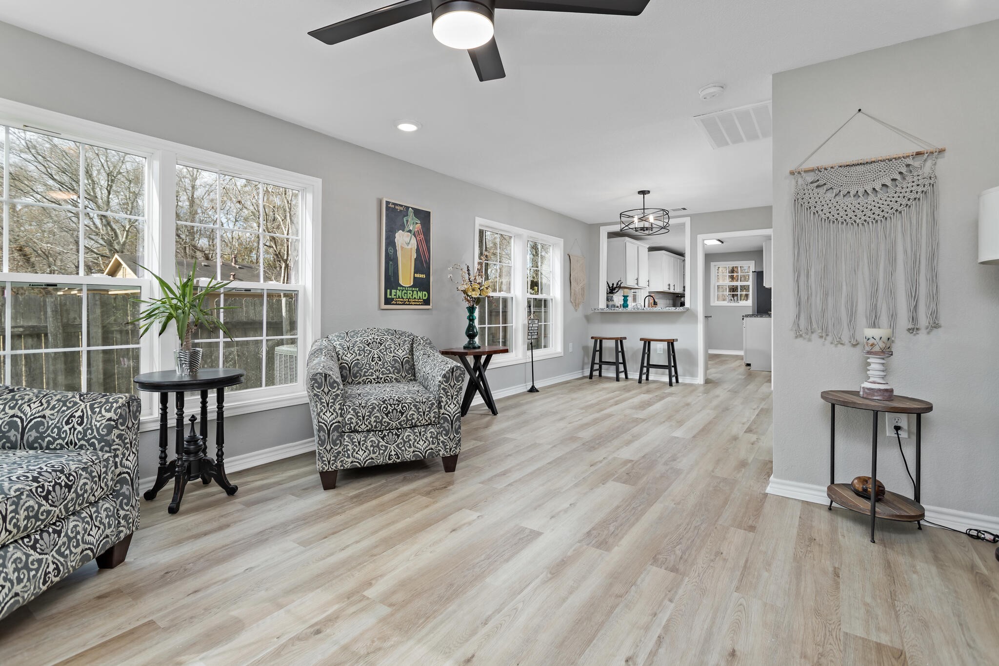 2320 Delaware Street Beaumont, TX 77703 - Photo 6 of 27 a living room with furniture and a large window
