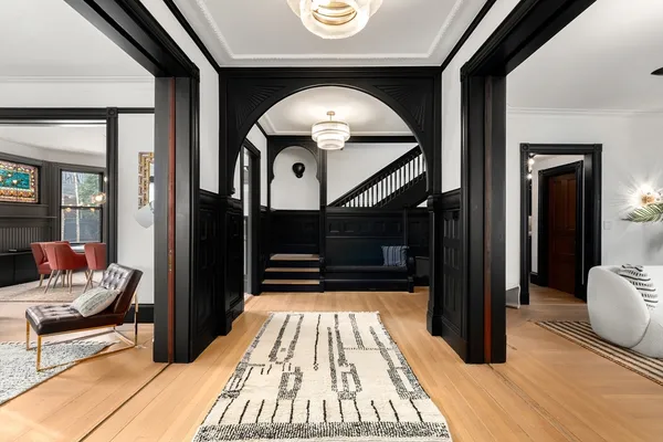 a view of entryway with wooden floor
