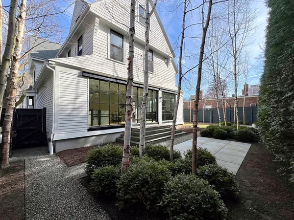 a house with trees in front of it