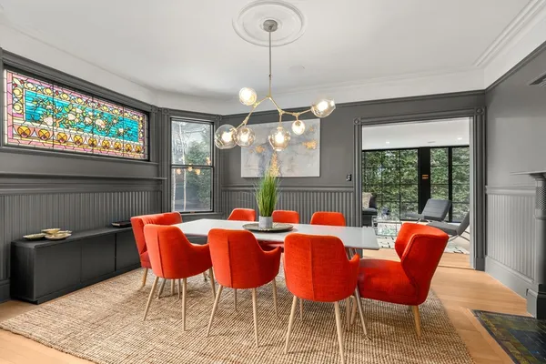 a view of a dining room with furniture window and outside view