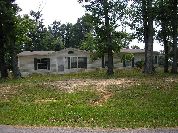 704 Huffville Road Northeast Pilot, VA 24138 - Photo 1 of 1 a view of a house with yard and tree s