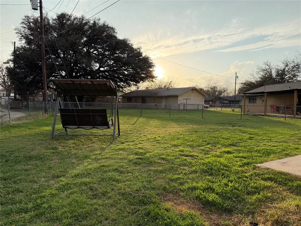 a view of a swimming pool with a garden