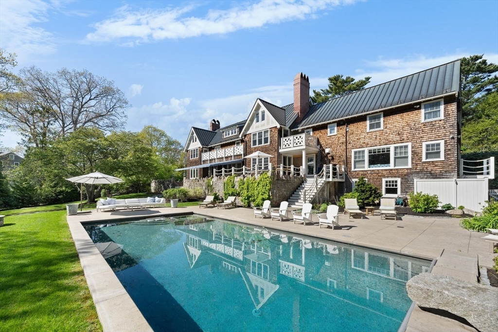 a front view of a house with swimming pool