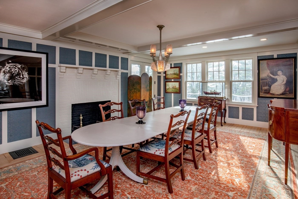 23 University Lane Manchester, MA 01944 - Photo 14 of 40 a view of a dining room with furniture window and outside view