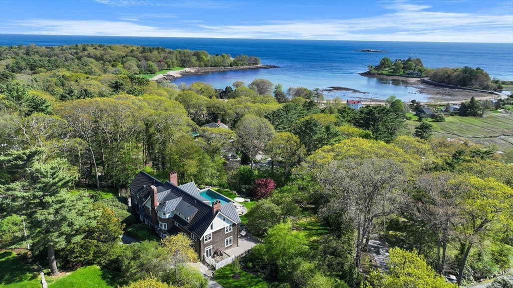 23 University Lane Manchester, MA 01944 - Photo 2 of 40 an aerial view of a houses with a yard