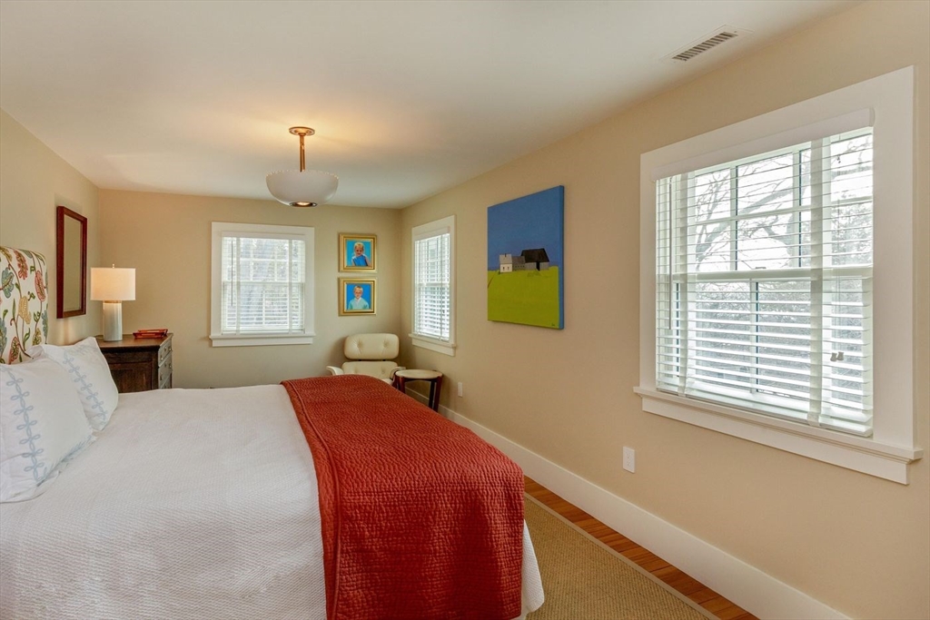 23 University Lane Manchester, MA 01944 - Photo 29 of 40 a bed room with a bed and a window