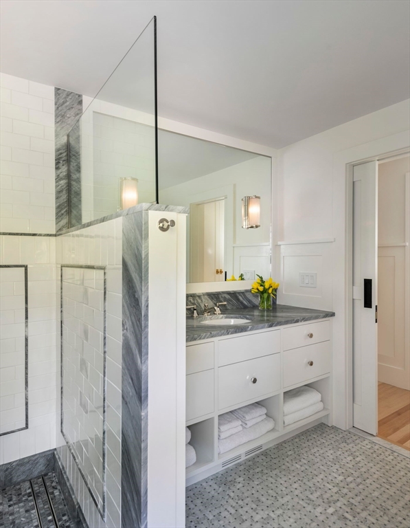 23 University Lane Manchester, MA 01944 - Photo 31 of 40 a kitchen with a refrigerator and sink