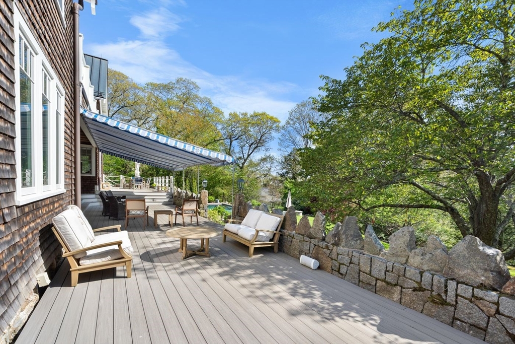 23 University Lane Manchester, MA 01944 - Photo 5 of 40 a view of balcony with couch and chairs