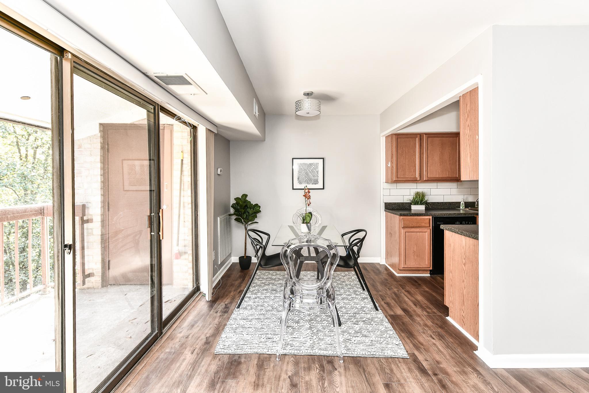 2245 Castle Rock Square, Unit 21C Reston, VA 20191 - Photo 11 of 26 Separate dining space with great view!