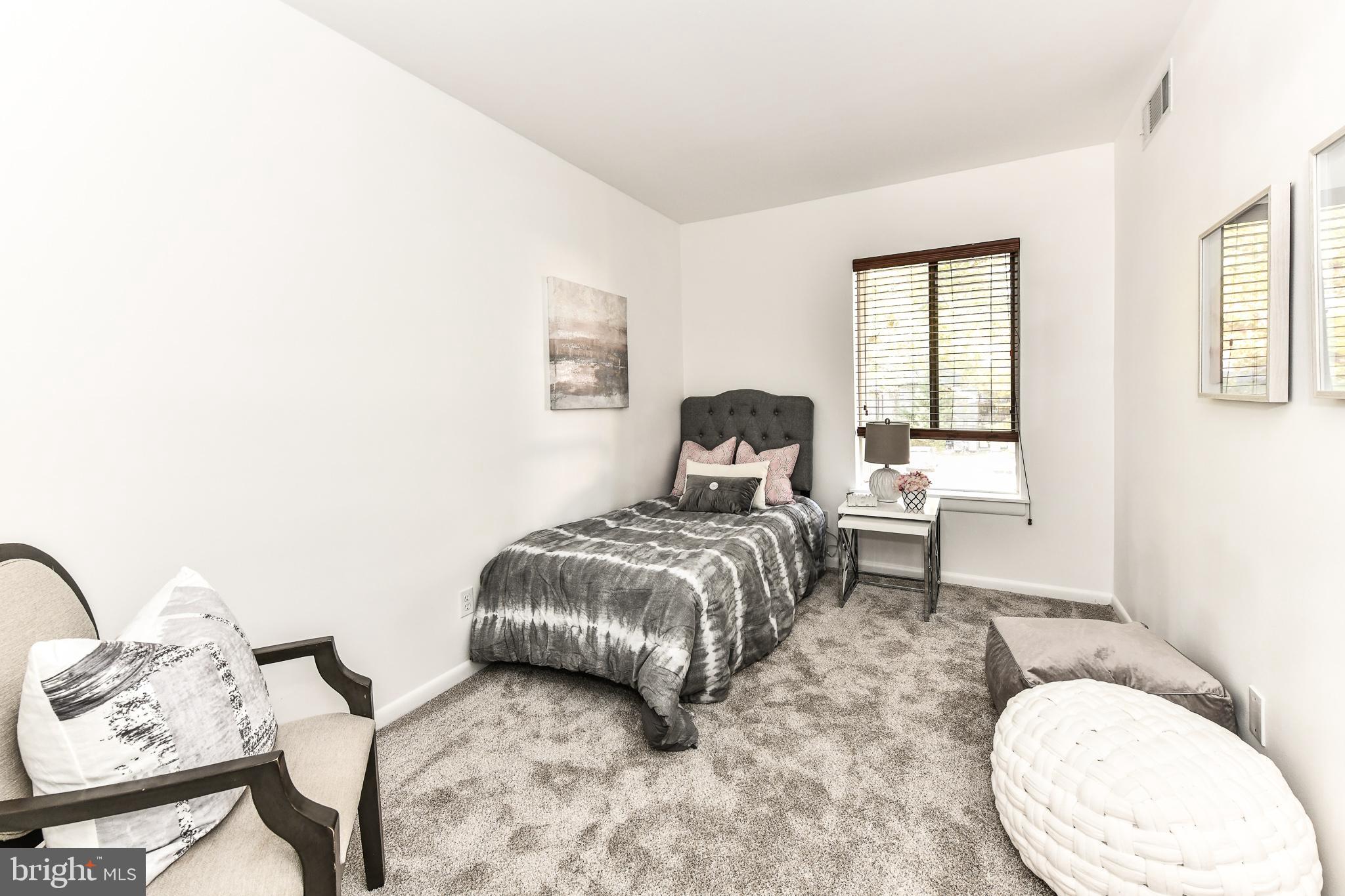 2245 Castle Rock Square, Unit 21C Reston, VA 20191 - Photo 20 of 26 Bedroom #3 with new carpet and paint!