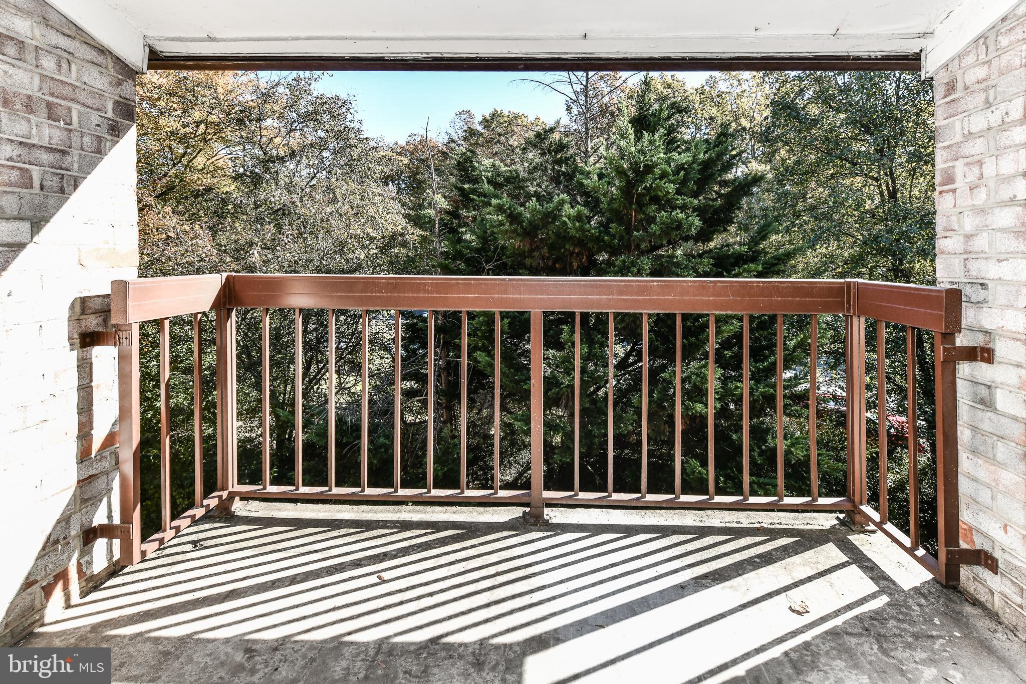 2245 Castle Rock Square, Unit 21C Reston, VA 20191 - Photo 23 of 26 Private balcony backing to trees!!