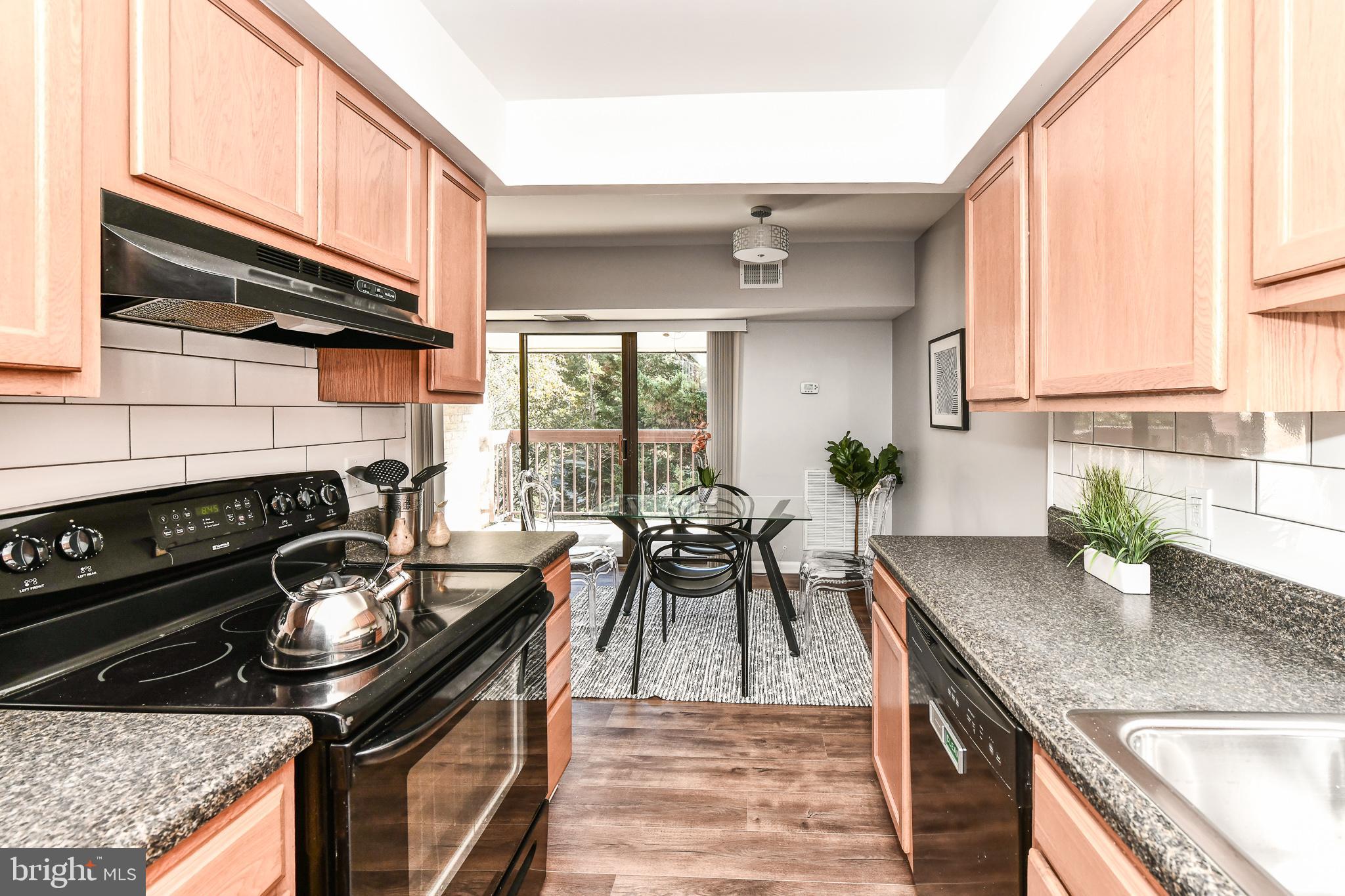 2245 Castle Rock Square, Unit 21C Reston, VA 20191 - Photo 10 of 26 Spacious kitchen with lots of cabinets!