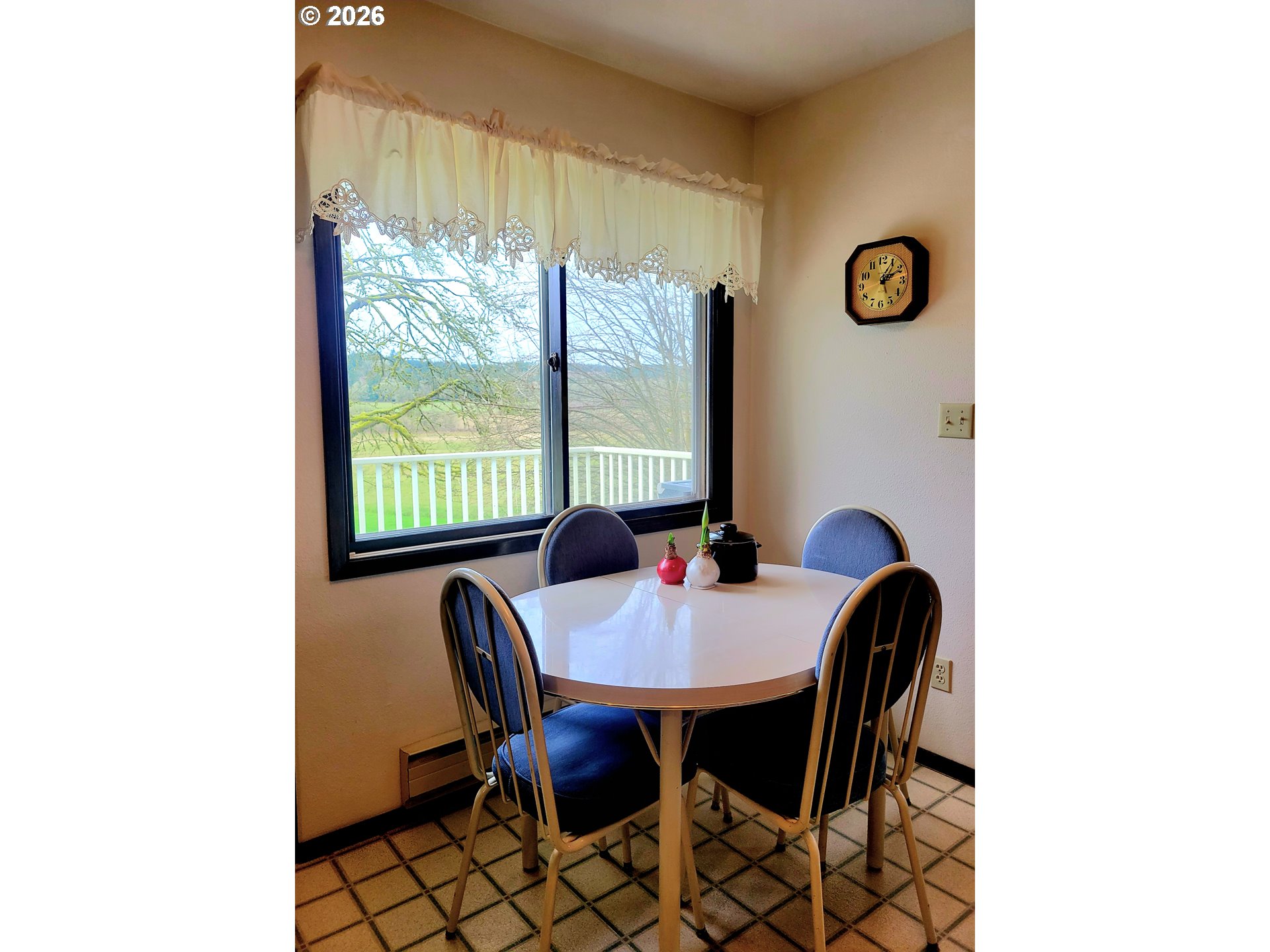 570 Drews Prairie Road Winlock, WA 98596 - Photo 21 of 41 a view of a dining room with furniture and window