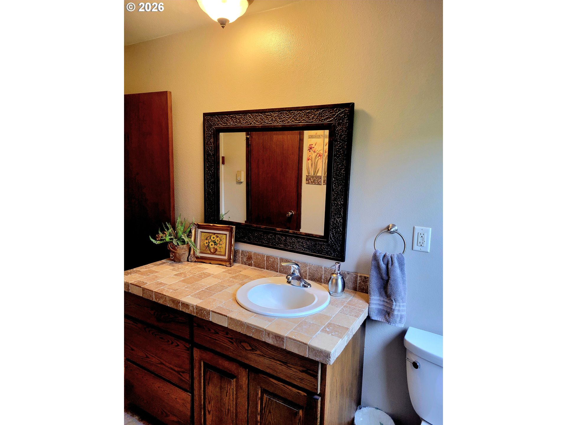 570 Drews Prairie Road Winlock, WA 98596 - Photo 27 of 41 a bathroom with a sink and a mirror