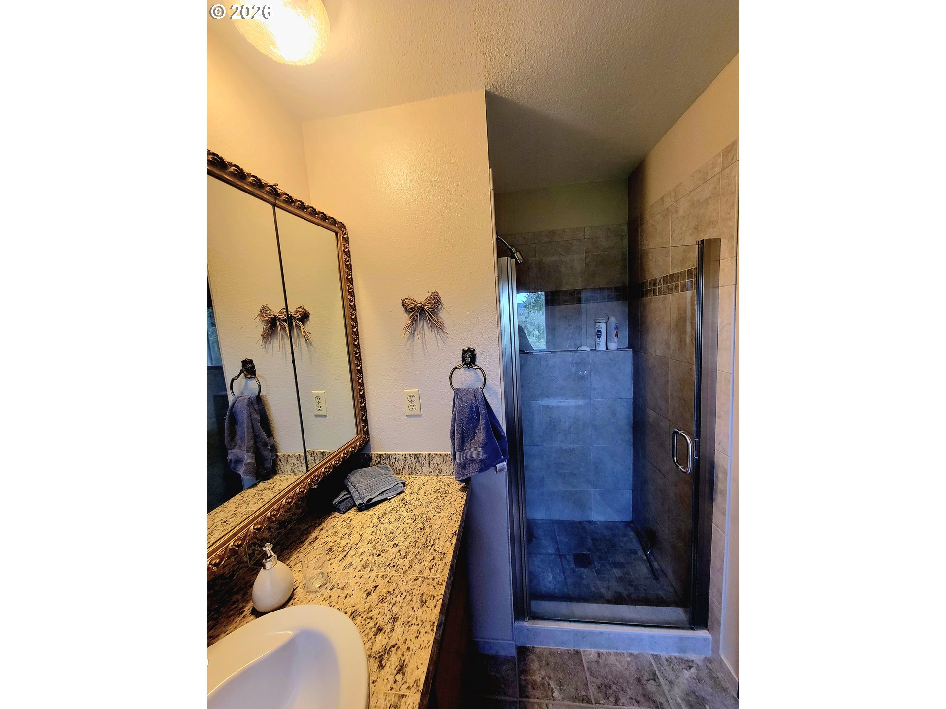 570 Drews Prairie Road Winlock, WA 98596 - Photo 31 of 41 a living room with furniture and a painting on the wall