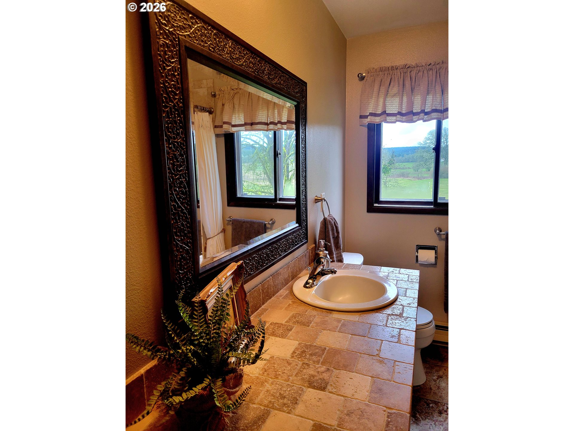 570 Drews Prairie Road Winlock, WA 98596 - Photo 33 of 41 a bathroom with a sink and a mirror