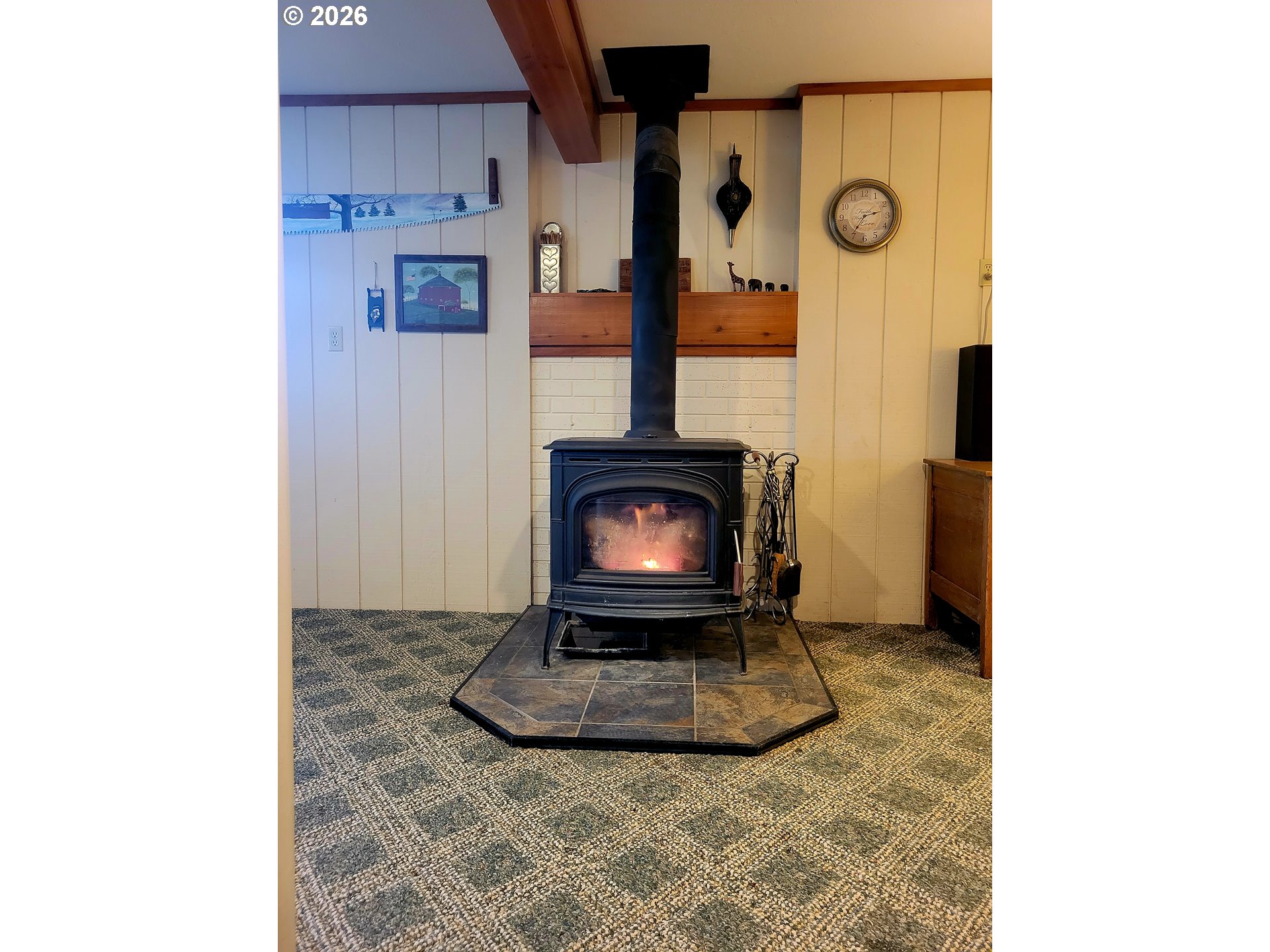570 Drews Prairie Road Winlock, WA 98596 - Photo 38 of 41 a living room with a fireplace
