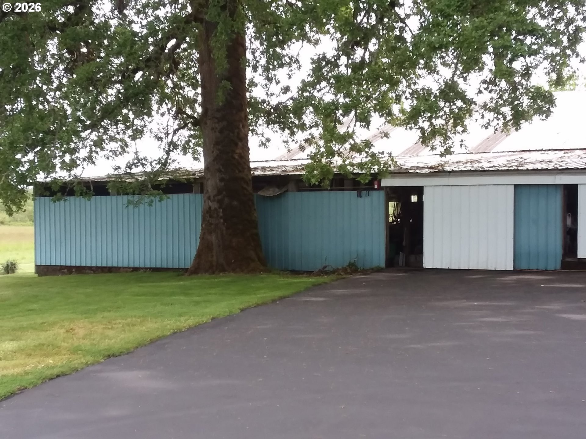 570 Drews Prairie Road Winlock, WA 98596 - Photo 6 of 41 a house with a tree in front of it