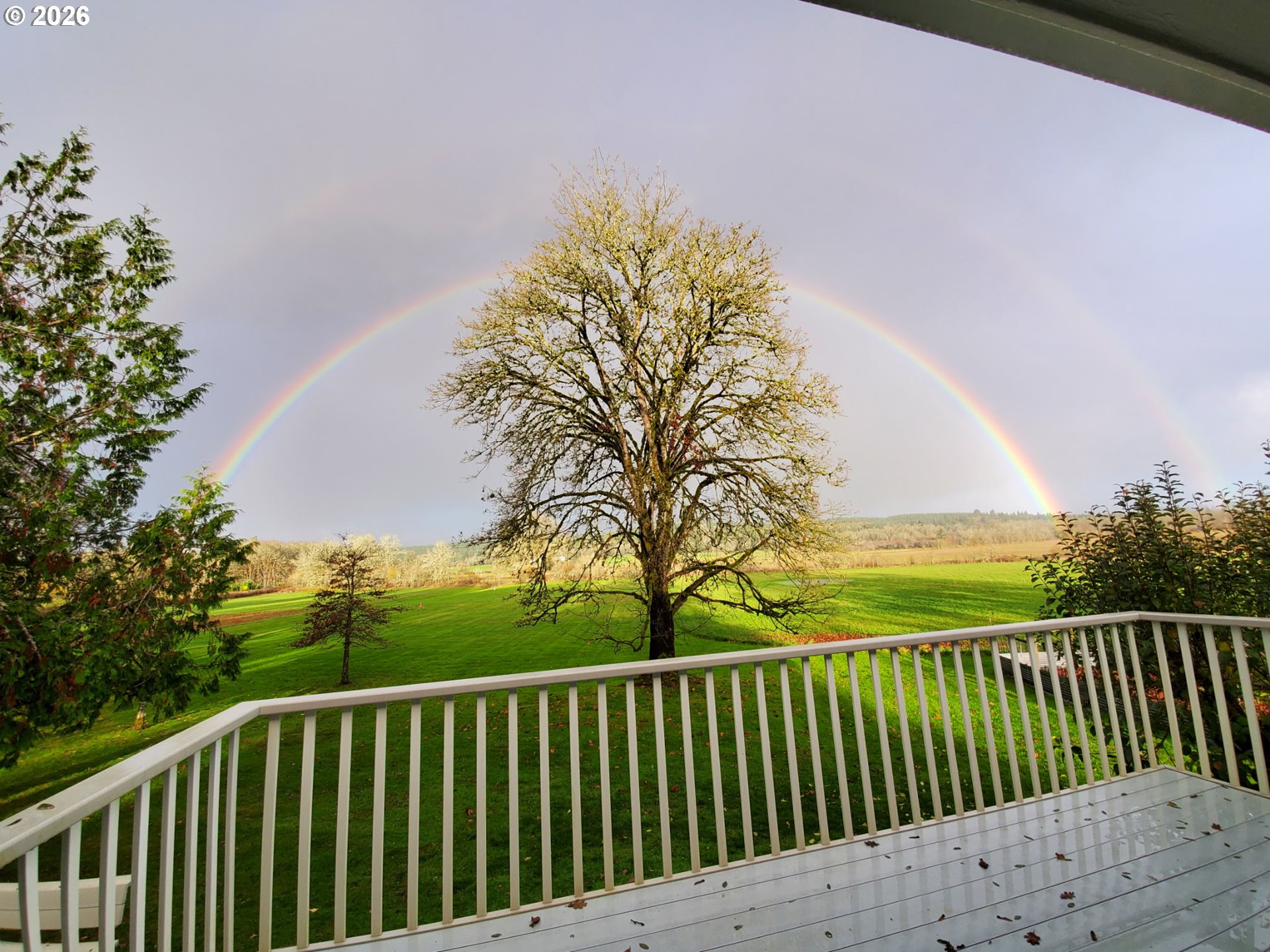 570 Drews Prairie Road Winlock, WA 98596 - Photo 9 of 41 a balcony with wooden floor and fence