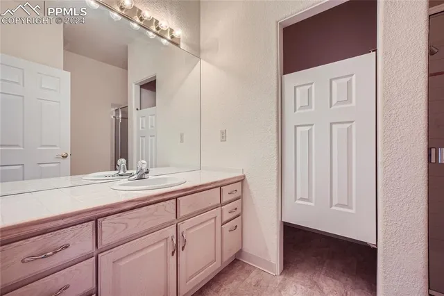 a view of a balcony with wooden floor