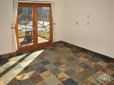 22 Spruce Circle Edwards, CO 81632 - Photo 7 of 7 a view of an empty room with wooden floor and a window