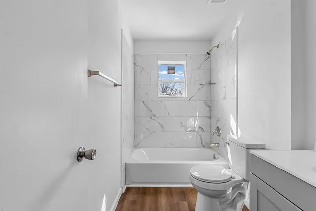 a bathroom with a sink toilet and bathtub
