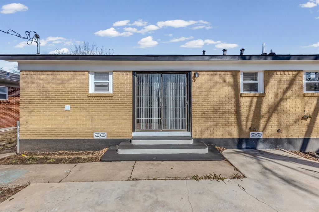 2117 Frazier Street Greenville, TX 75401 - Photo 23 of 25 a front view of a house with a yard
