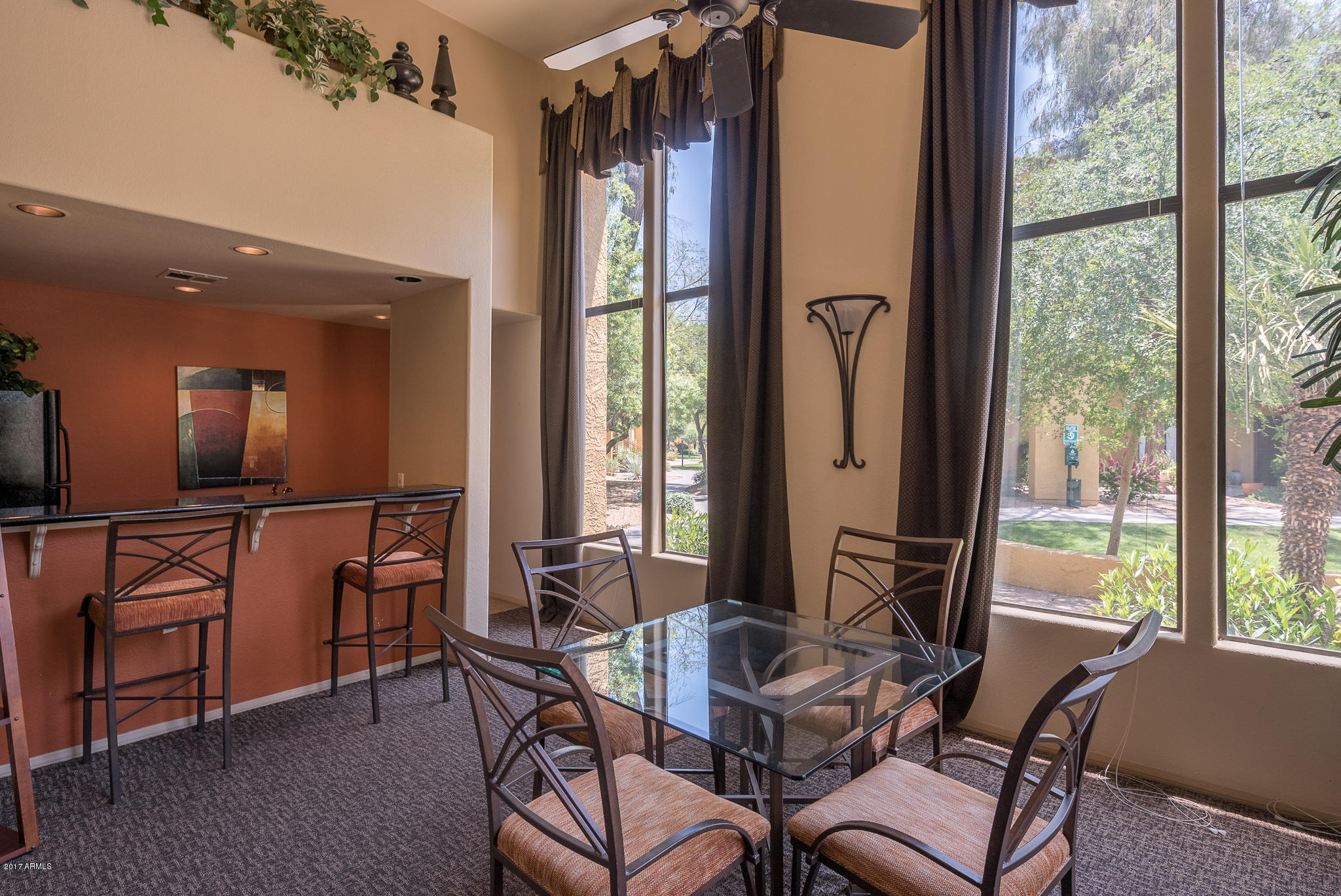 4925 East Desert Cove Avenue, Unit 363 Scottsdale, AZ 85254 - Photo 26 of 47 a view of a dining room with furniture window and outside view