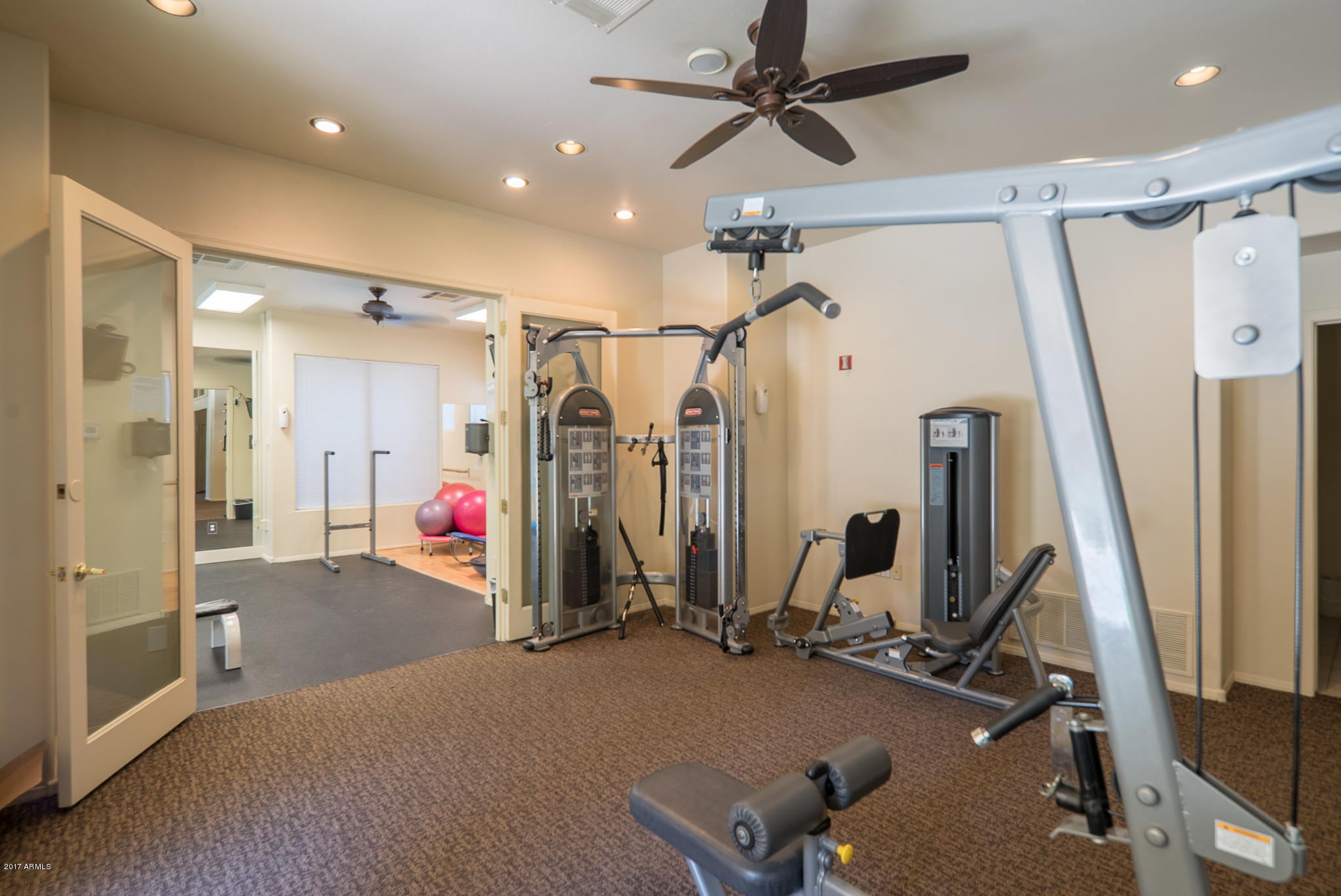 4925 East Desert Cove Avenue, Unit 363 Scottsdale, AZ 85254 - Photo 30 of 47 a view of a room with gym equipment