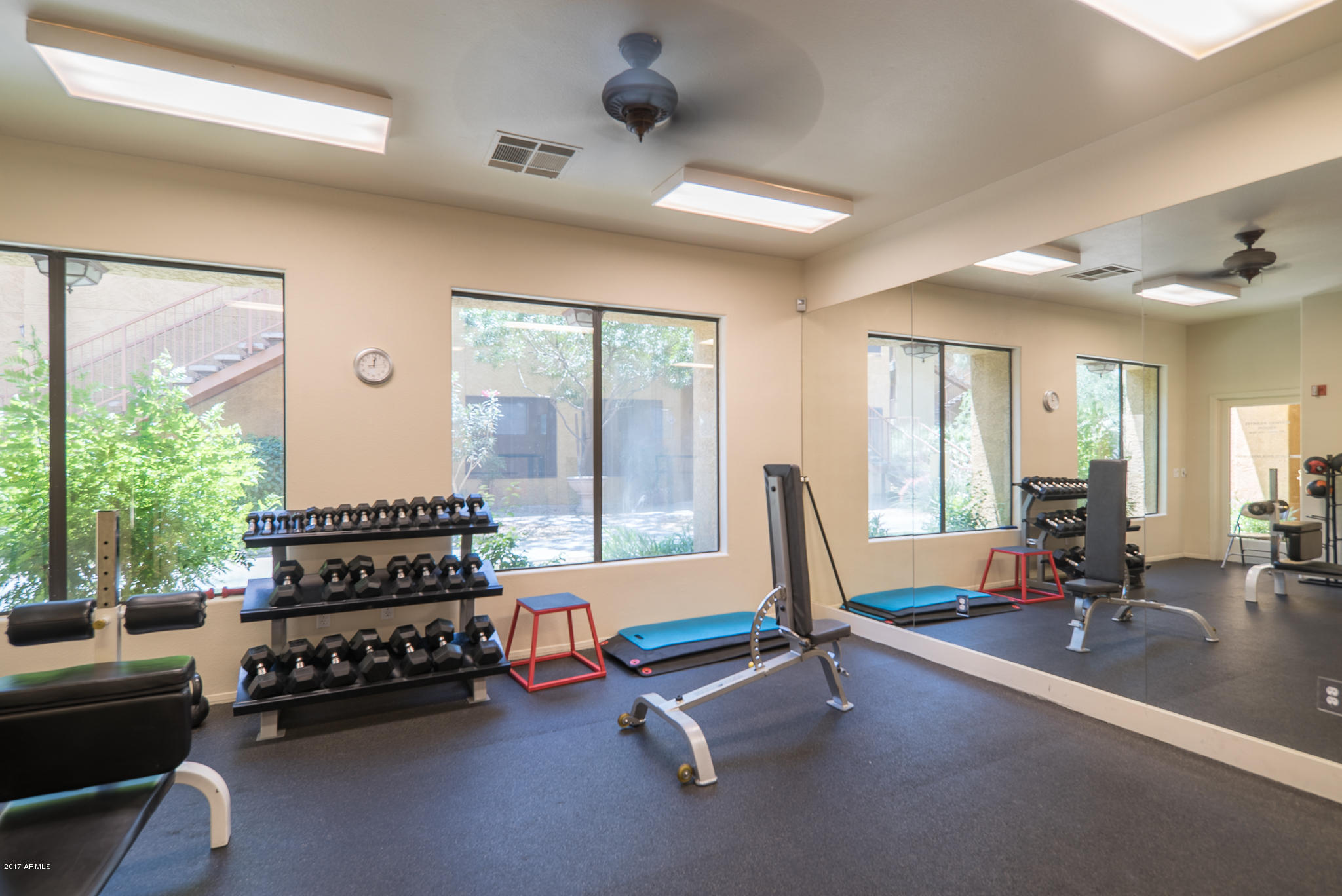 4925 East Desert Cove Avenue, Unit 363 Scottsdale, AZ 85254 - Photo 31 of 47 a living room with furniture and windows