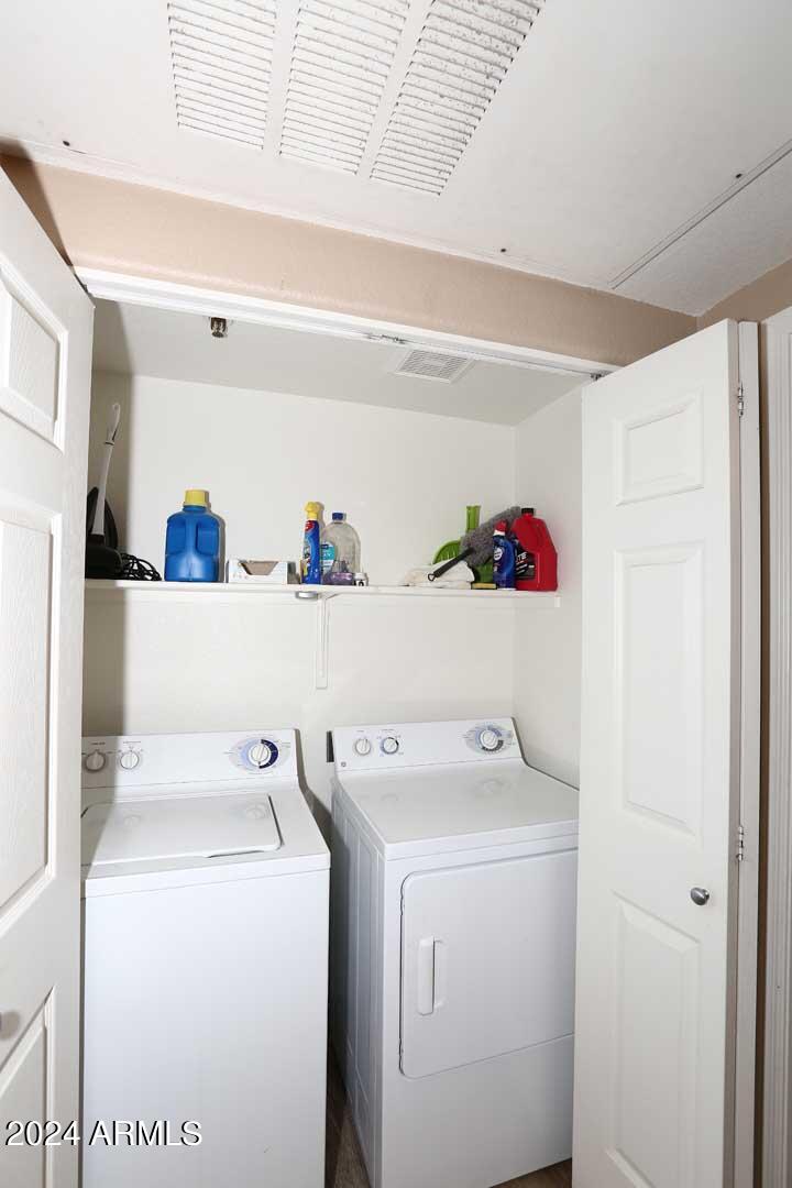 4925 East Desert Cove Avenue, Unit 363 Scottsdale, AZ 85254 - Photo 36 of 47 a utility room with dryer and washer