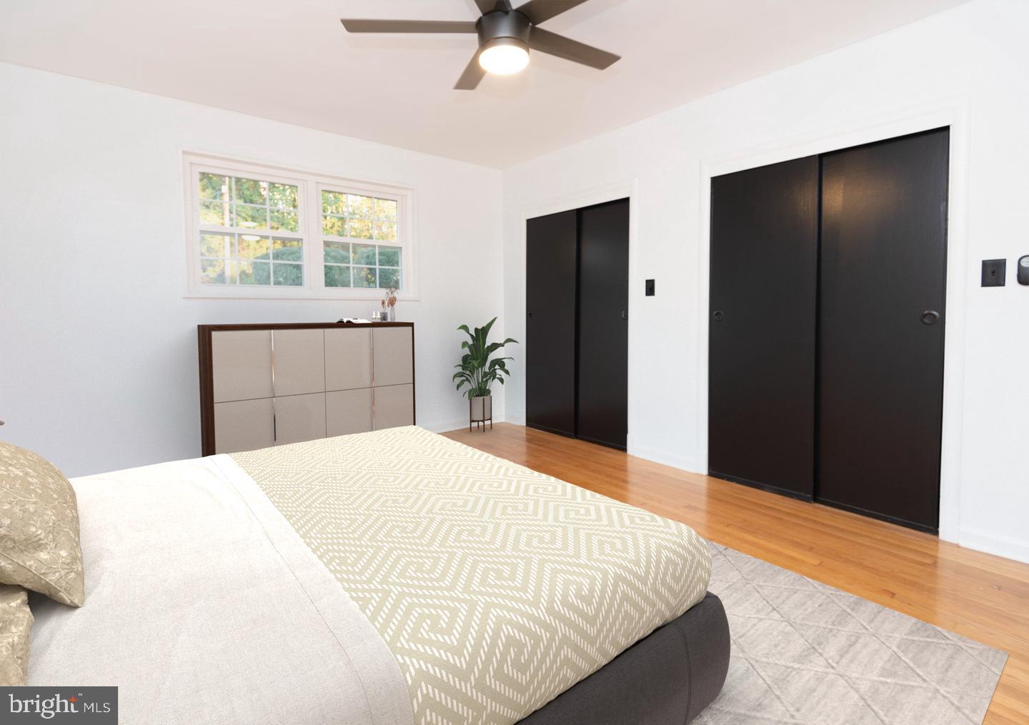 1323 Fernway Road Northwest Washington, DC 20012 - Photo 12 of 24 a bedroom with a bed and a large window