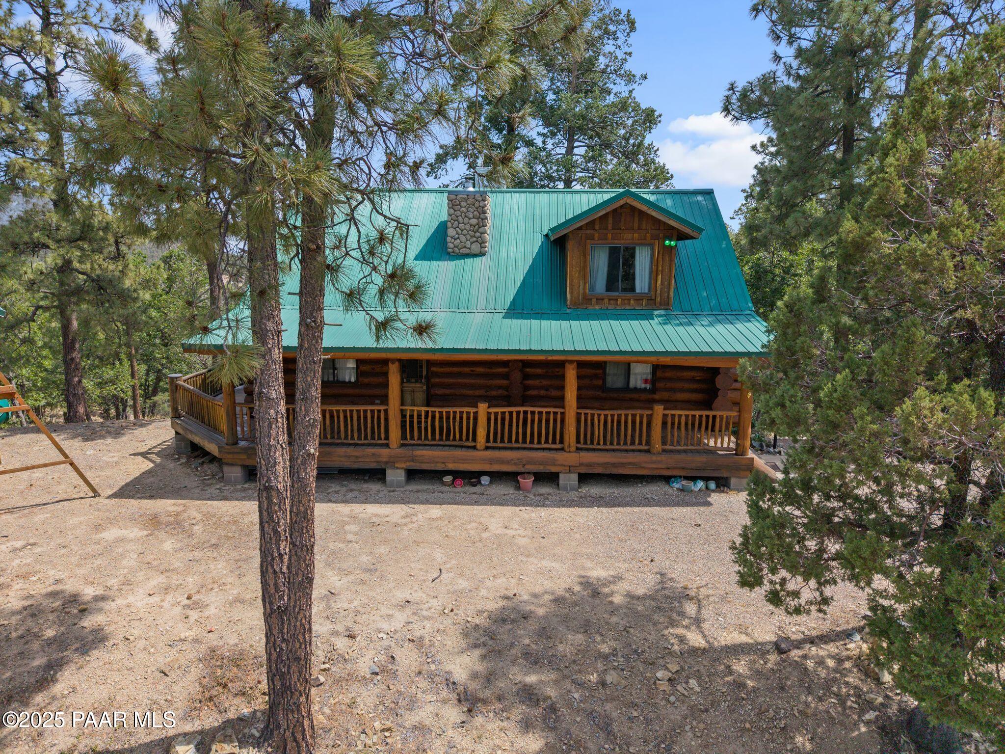 4575 East Combination Lane Prescott, AZ 86303 - Photo 1 of 50 a view of house with outdoor space and seating area