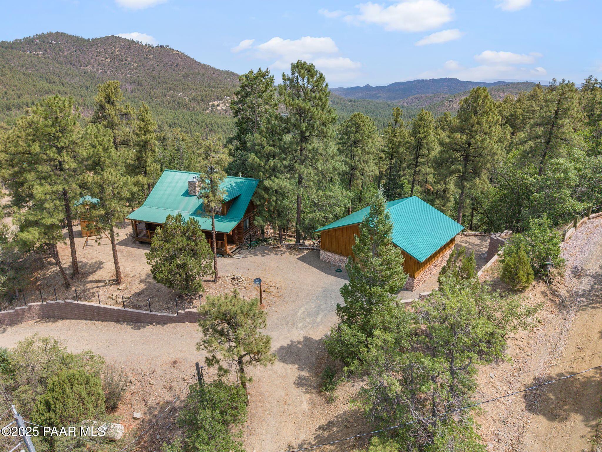 4575 East Combination Lane Prescott, AZ 86303 - Photo 3 of 50 an aerial view of a house with mountain view