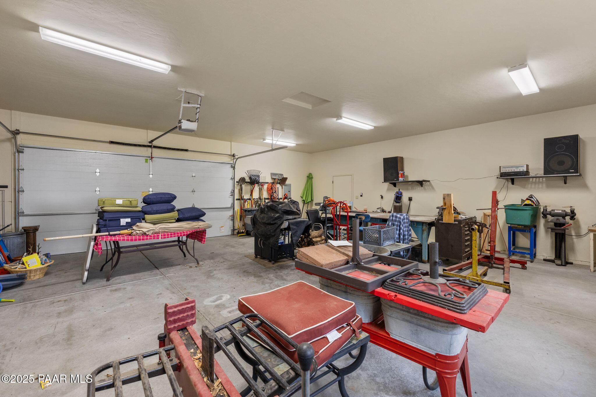 4575 East Combination Lane Prescott, AZ 86303 - Photo 38 of 50 a room with gym equipment and a table