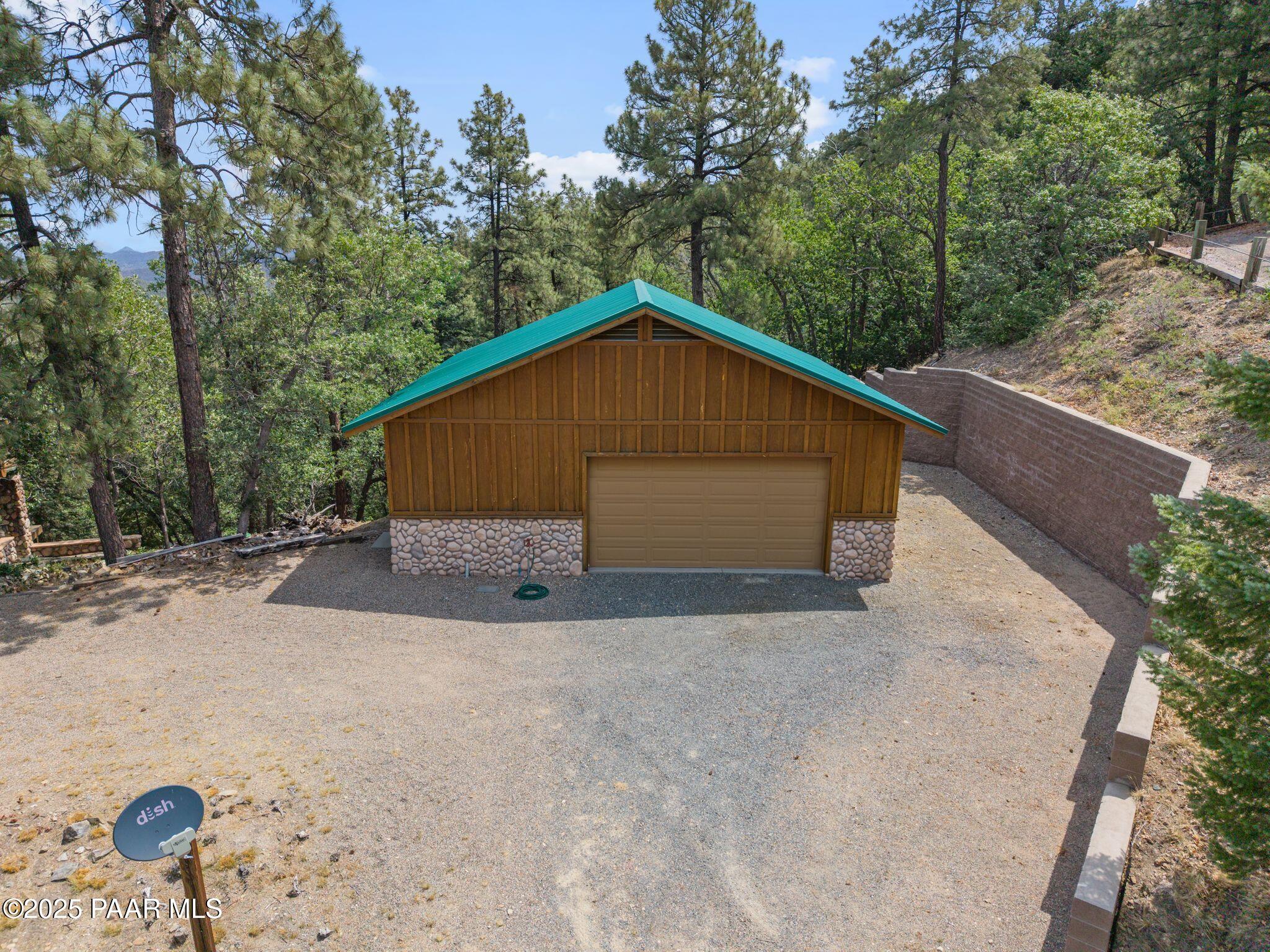 4575 East Combination Lane Prescott, AZ 86303 - Photo 39 of 50 a house with trees in the background