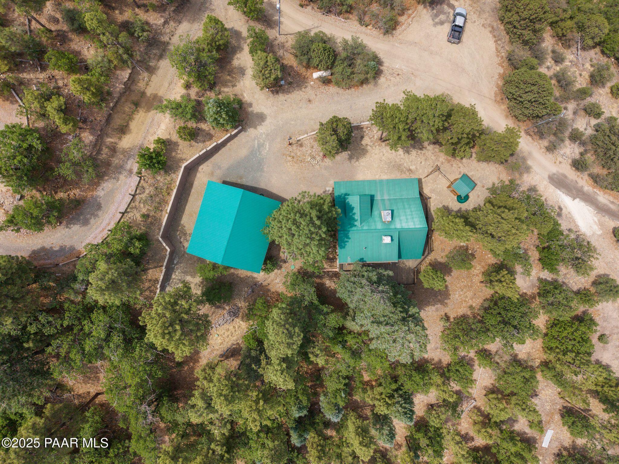 4575 East Combination Lane Prescott, AZ 86303 - Photo 48 of 50 an aerial view of a house with a yard and trees