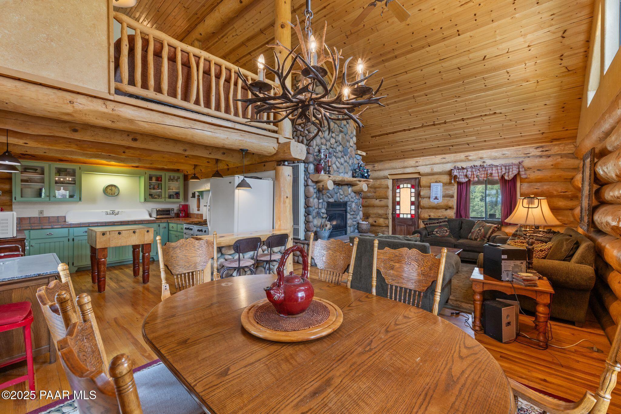 4575 East Combination Lane Prescott, AZ 86303 - Photo 10 of 50 a dining room with lots of wooden furniture