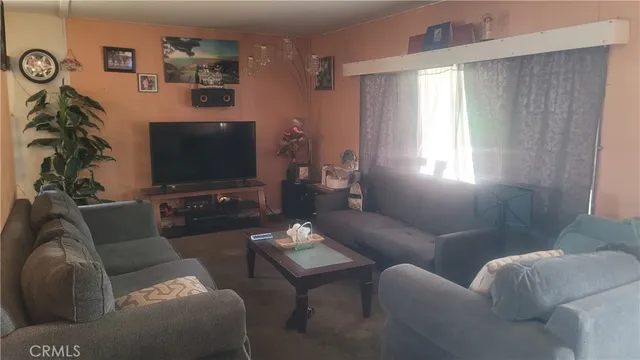 a kitchen with stainless steel appliances granite countertop a stove and a refrigerator