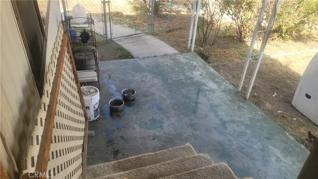a view of balcony with wooden floor