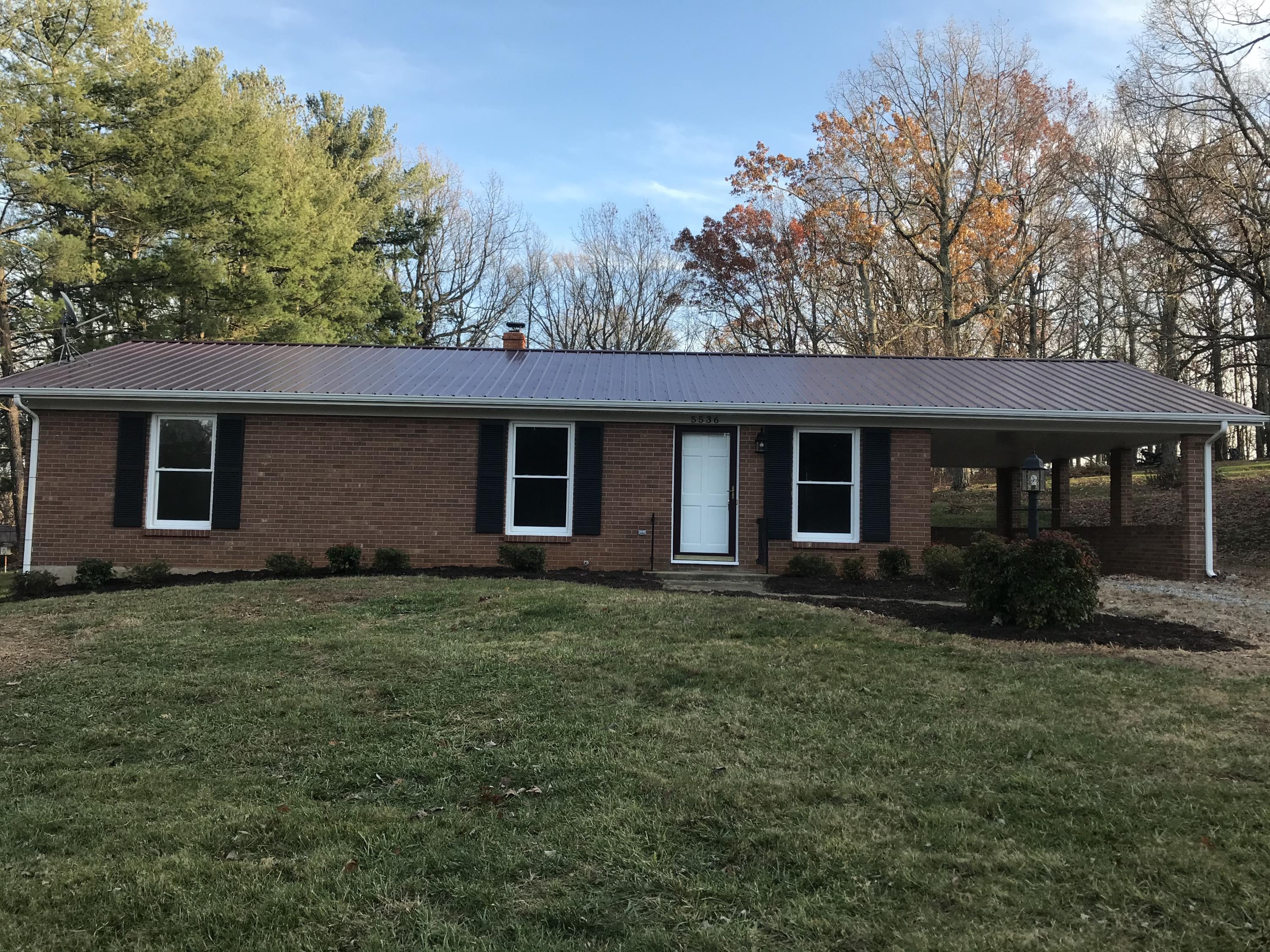 5536 Blue Ridge Drive Hurt, VA 24563 - Photo 1 of 14 a view of a house with backyard and garden
