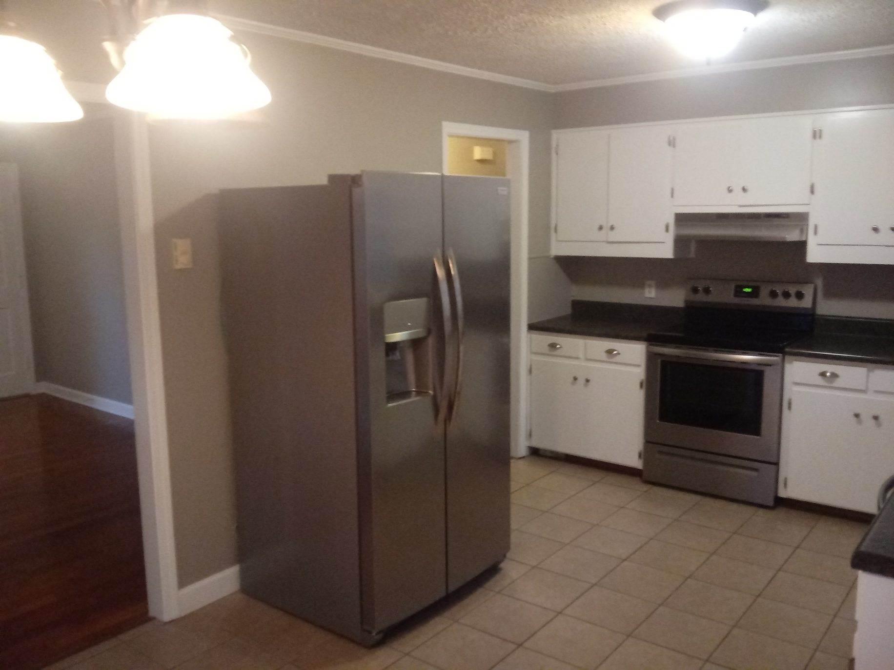 5536 Blue Ridge Drive Hurt, VA 24563 - Photo 4 of 14 a kitchen with stainless steel appliances a refrigerator sink and cabinets