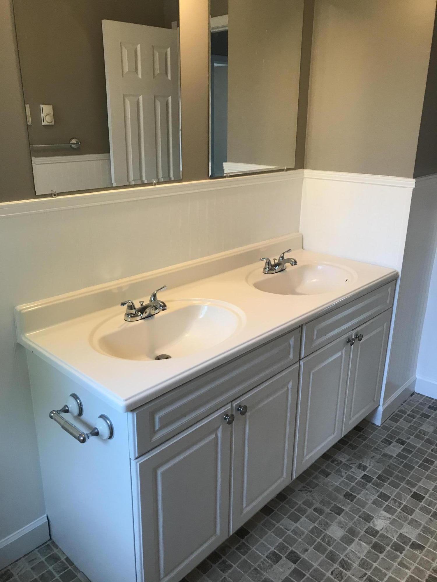 5536 Blue Ridge Drive Hurt, VA 24563 - Photo 8 of 14 a bathroom with a sink and a mirror