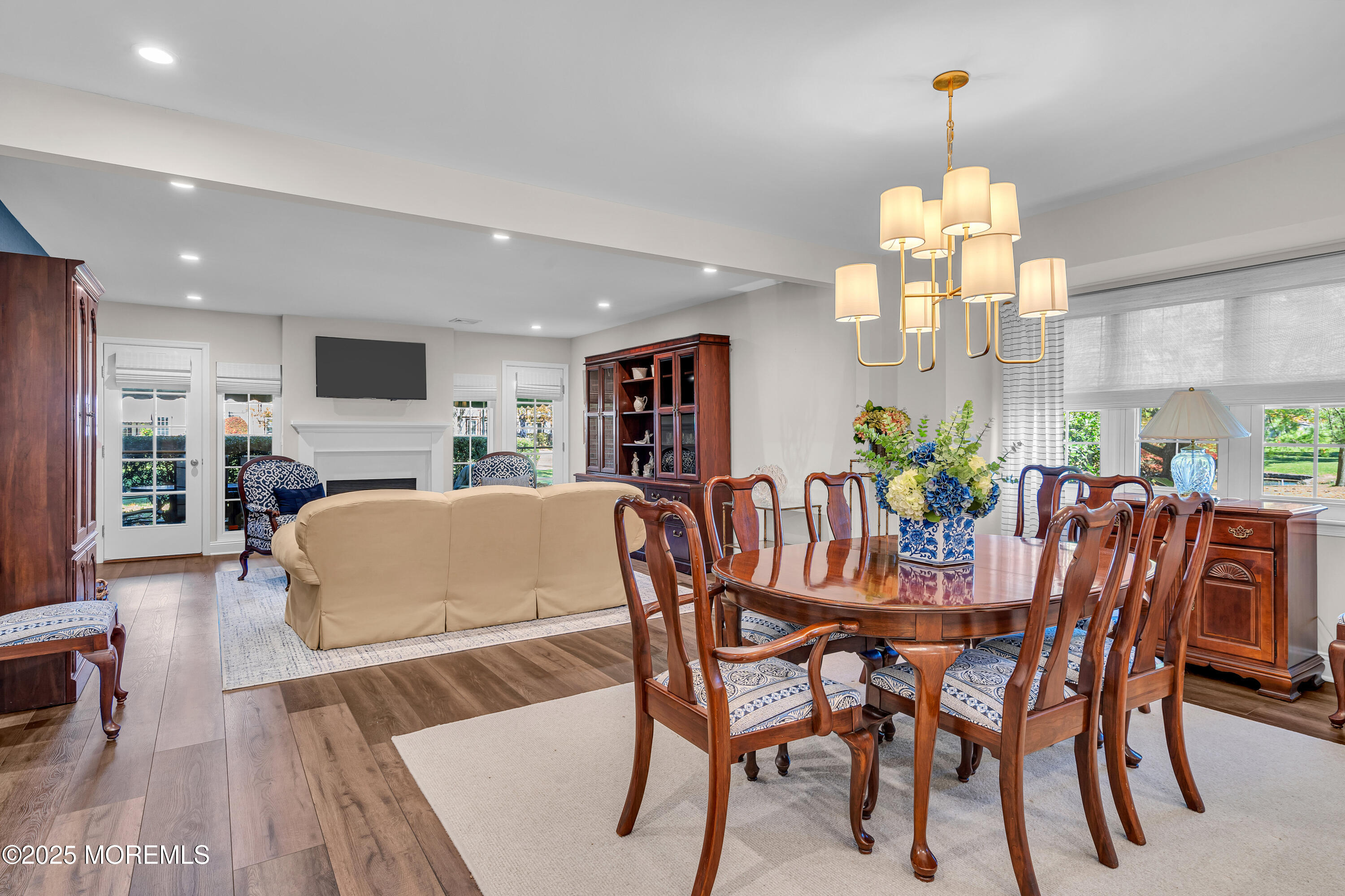 68 Maple Drive Spring Lake Heights, NJ 07762 - Photo 11 of 24 a view of a dining room with furniture wooden floor and chandelier